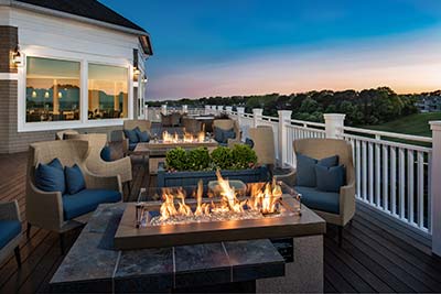 back deck at dusk with firepits